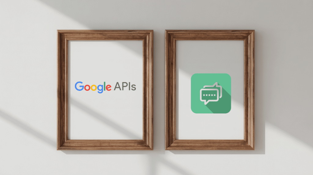Two wooden-framed pictures on a white wall; the left displays the Google APIs logo, while the right features a green icon with a chat bubble and ellipsis—perfect accents for any multi location review management workspace. Both frames cast diagonal shadows.